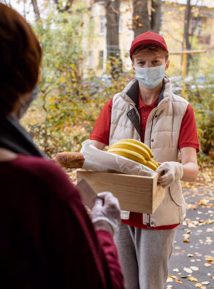 close-up-guy-delivering-order_23-2148773373
